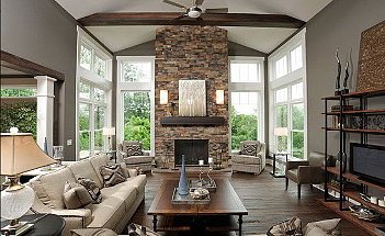 modern-living-room-design-ideas-with-fireplace-wooden-flooring-ceiling-fan-cream-sofa-design-wood-table-brown-armchair-table-lamp-glass-window-interior-living-room-furniture-sets
